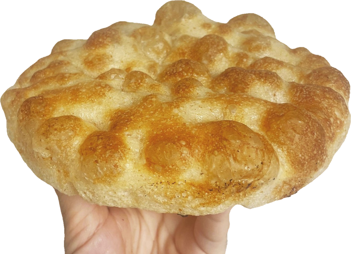 Base per focaccia PizzaLab tenuta in mano